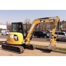 Выкорчевывание пней мини-экскаватором Caterpillar 305